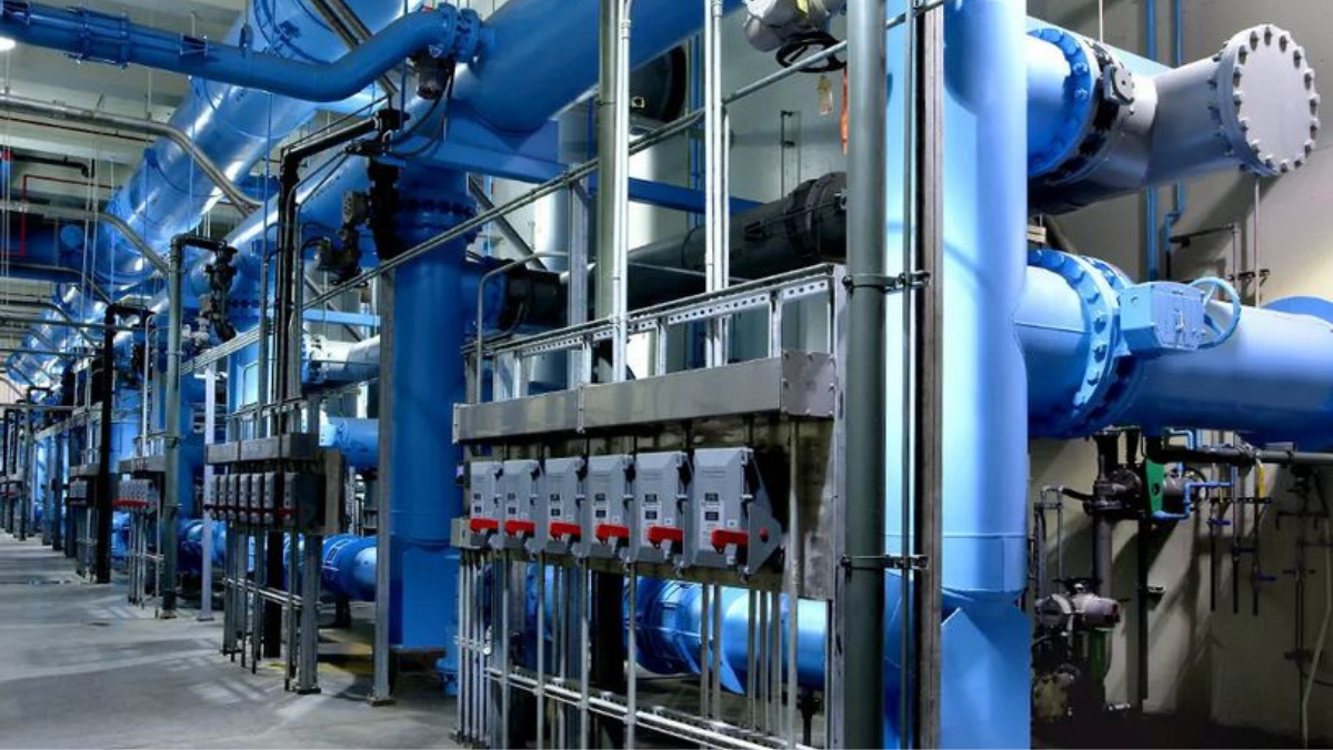 Large lined water pond and treatment units supporting oilfield operations in the Middle East.