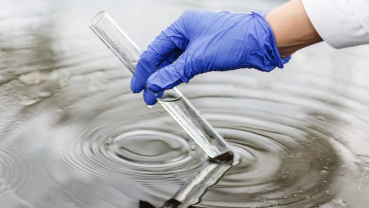 Laboratory water sampling illustrating regulatory oversight of produced water in oil and gas operations