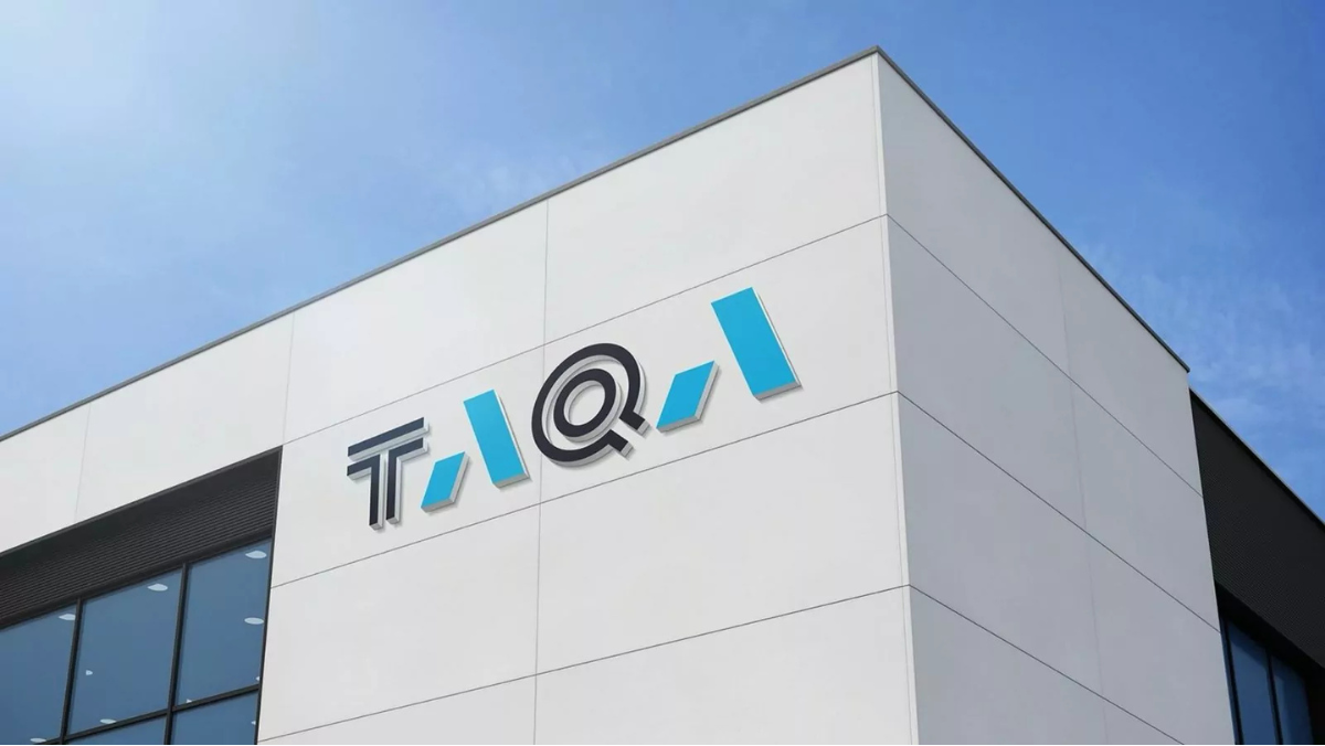 TAQA corporate logo displayed on the exterior of a modern utility building