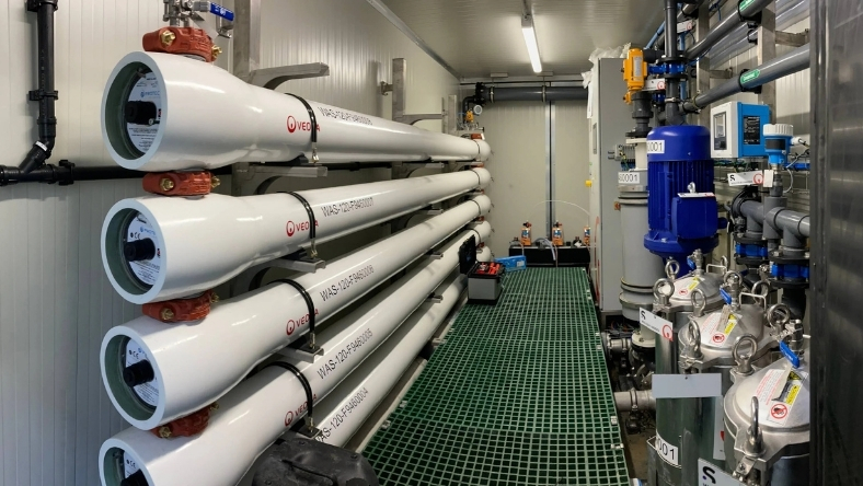 Industrial water treatment system with filtration membranes and piping